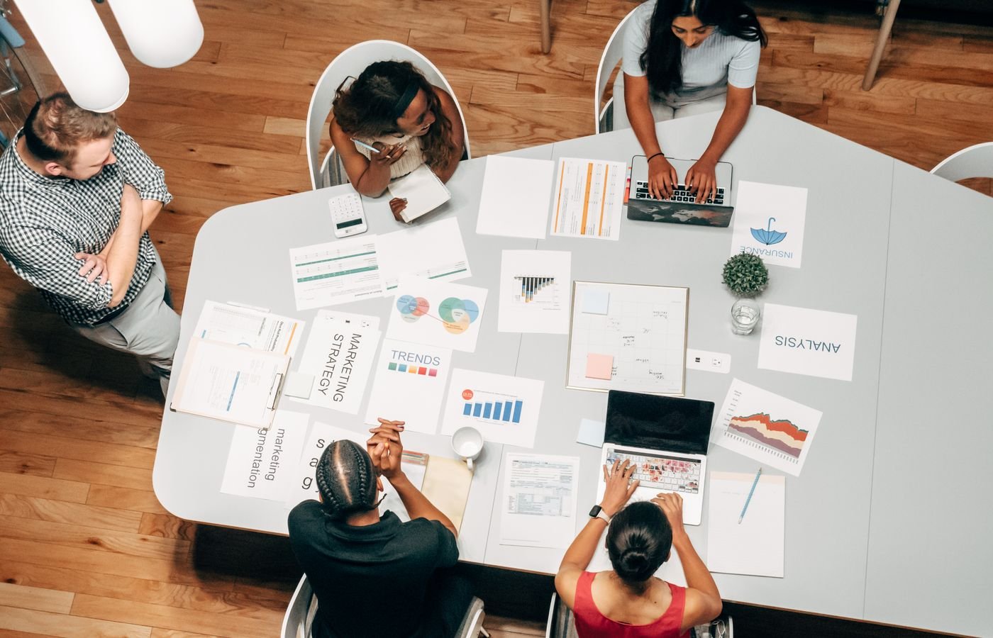 Engineering team collaborating on connected healthcare IoT and messaging platforms